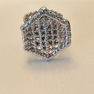 Textured Silver toned statement ring.
